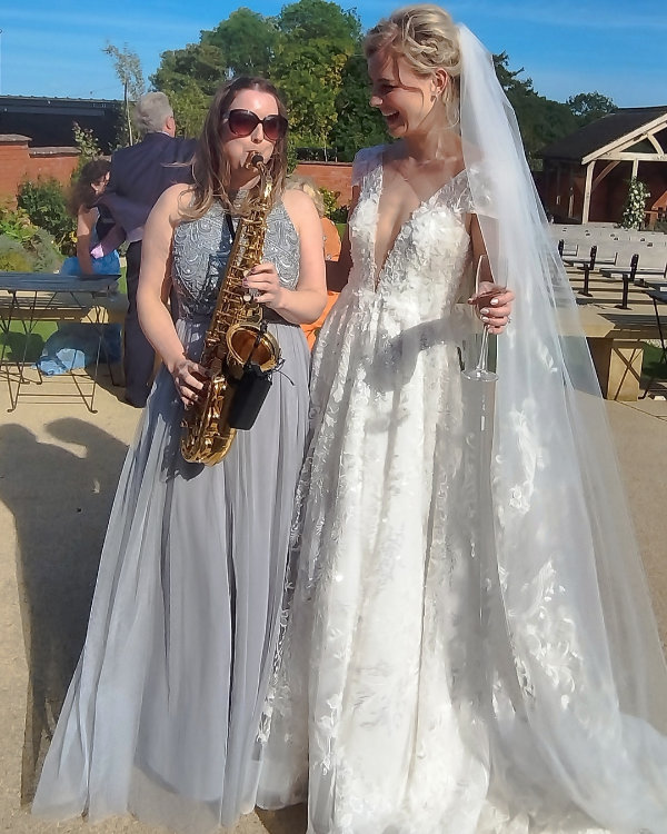 Clare with a bride as part of her live wedding music package