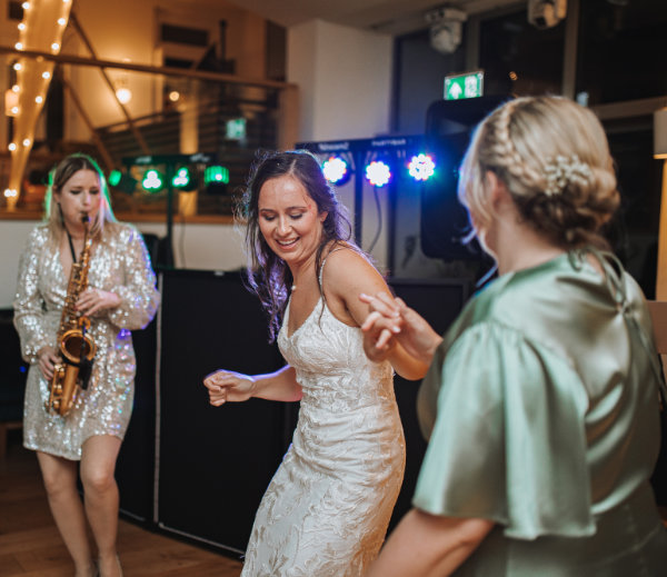 A bride dancing to live wedding music from Clare